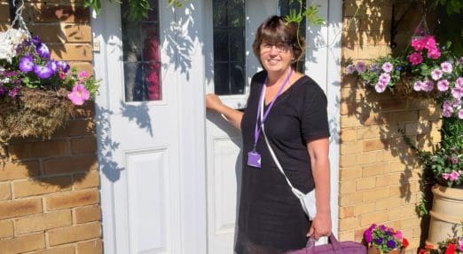 Nurse debbie outside a patient home