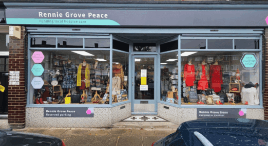 Rennie Grove Peace charity shop storefront in Radlett, displaying pre-loved fashion and homeware in the shop windows.