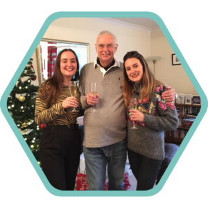 Dave and his two daughters at Christmas