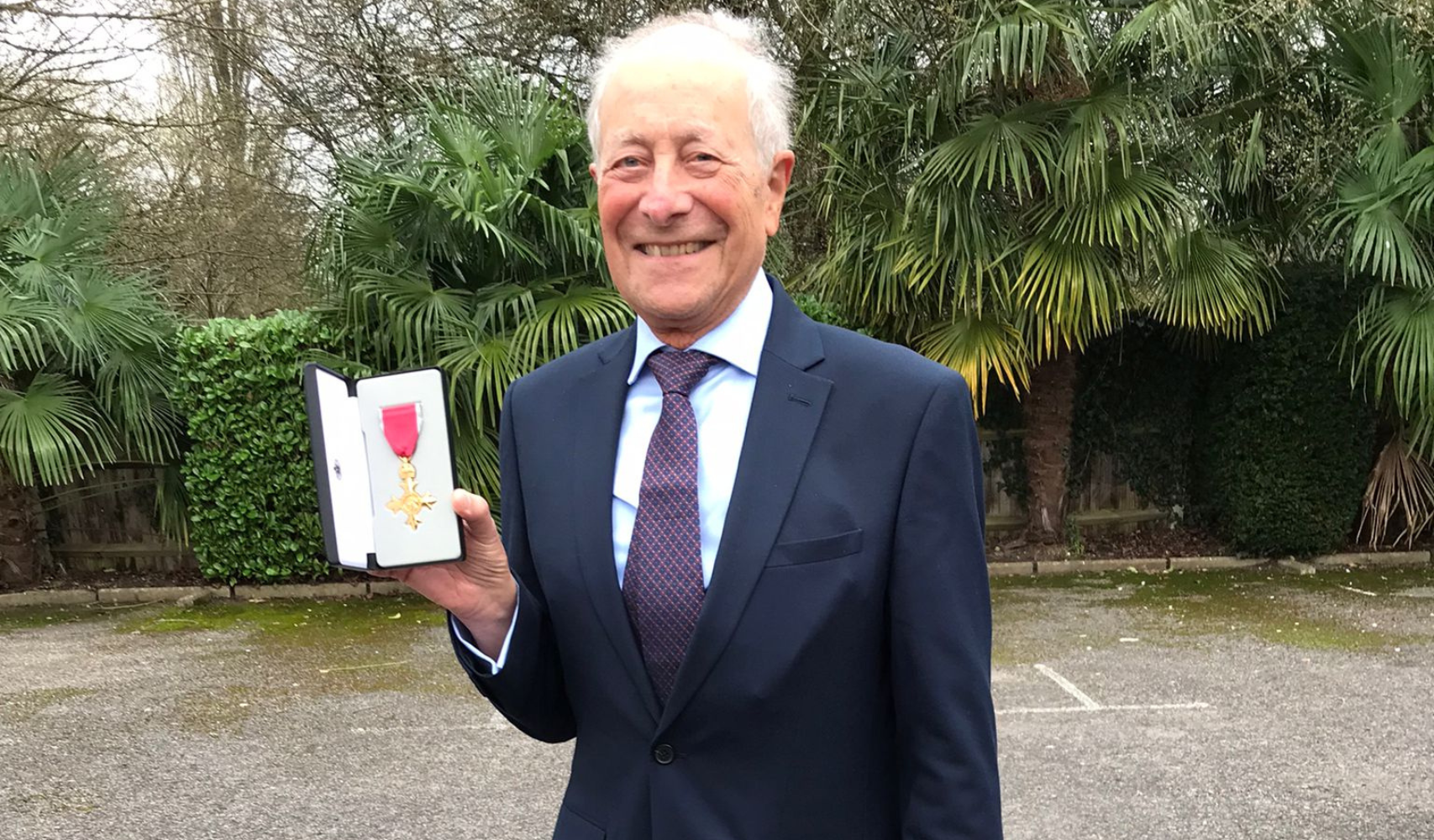 Joint President of Rennie Grove Peace receives OBE at Windsor Castle