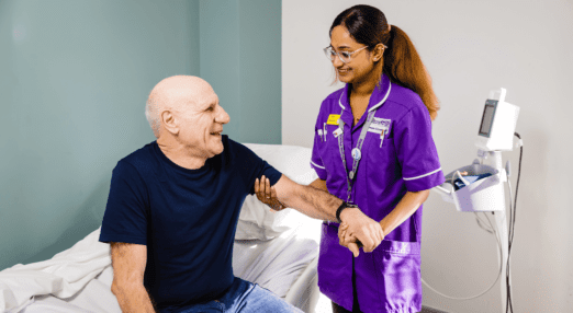 Karuna caring for a patient