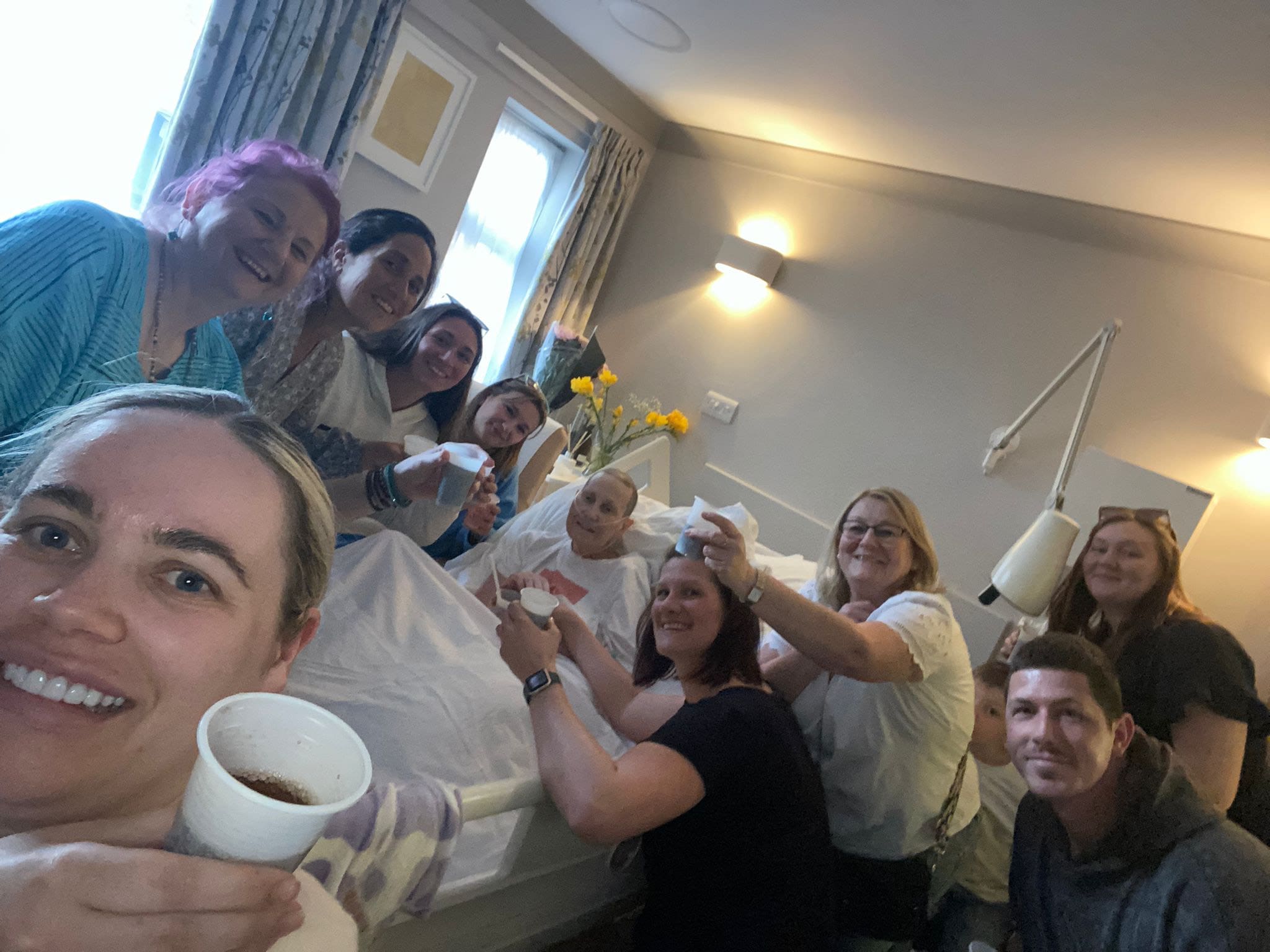 patient at rennie grove peace IPU with friends and family