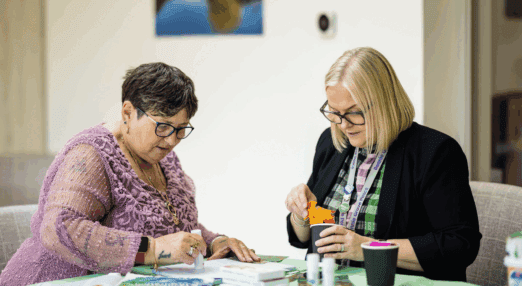 two women creating art