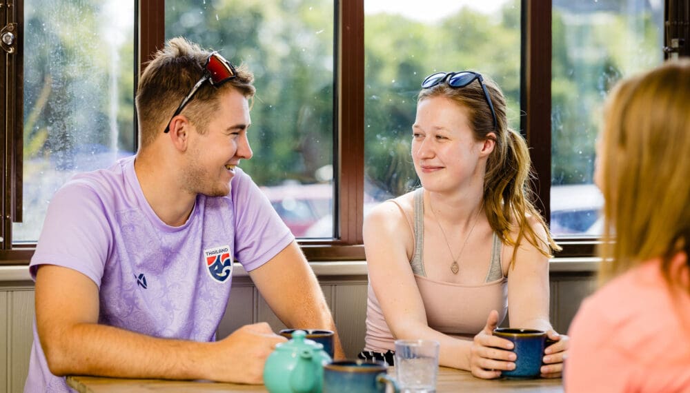 two young people talking