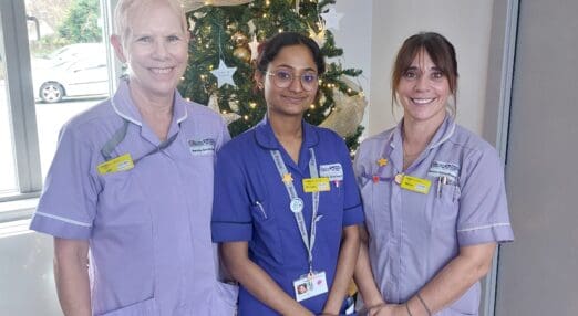 The Inpatient Unit care team at Rennie Grove Peace Hospice Care together at Christmas, supporting patients and families.