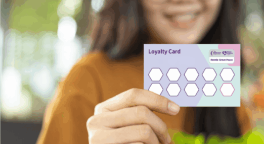 Hand holding the loyalty card