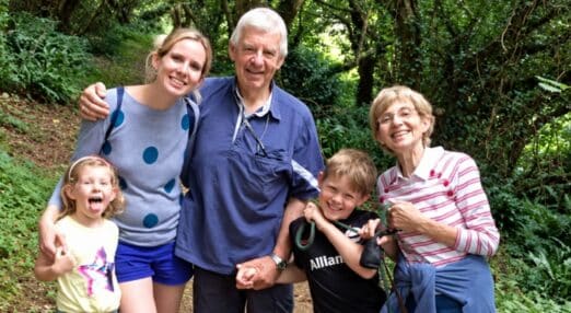 Dawn and Allen Goodship with their family smiling outside